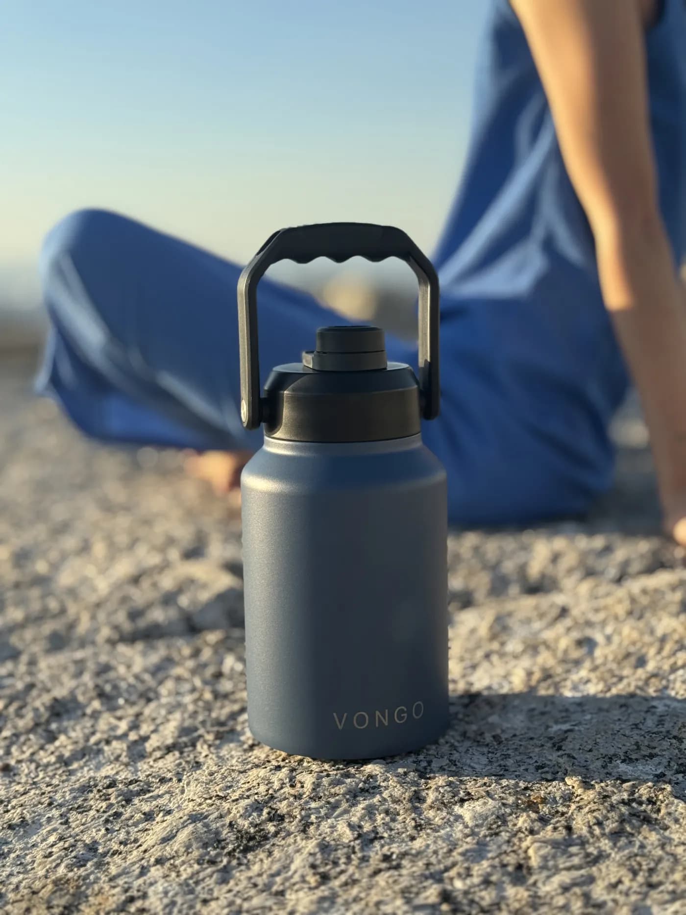 A Vongo flask on a rock at sunset